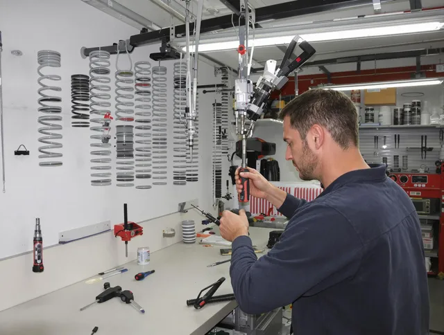 Berea Garage Door Repair safety certified technician performing precision spring replacement in Berea