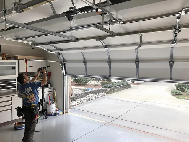 Garage door track repair service by Berea Garage Door Repair in Berea